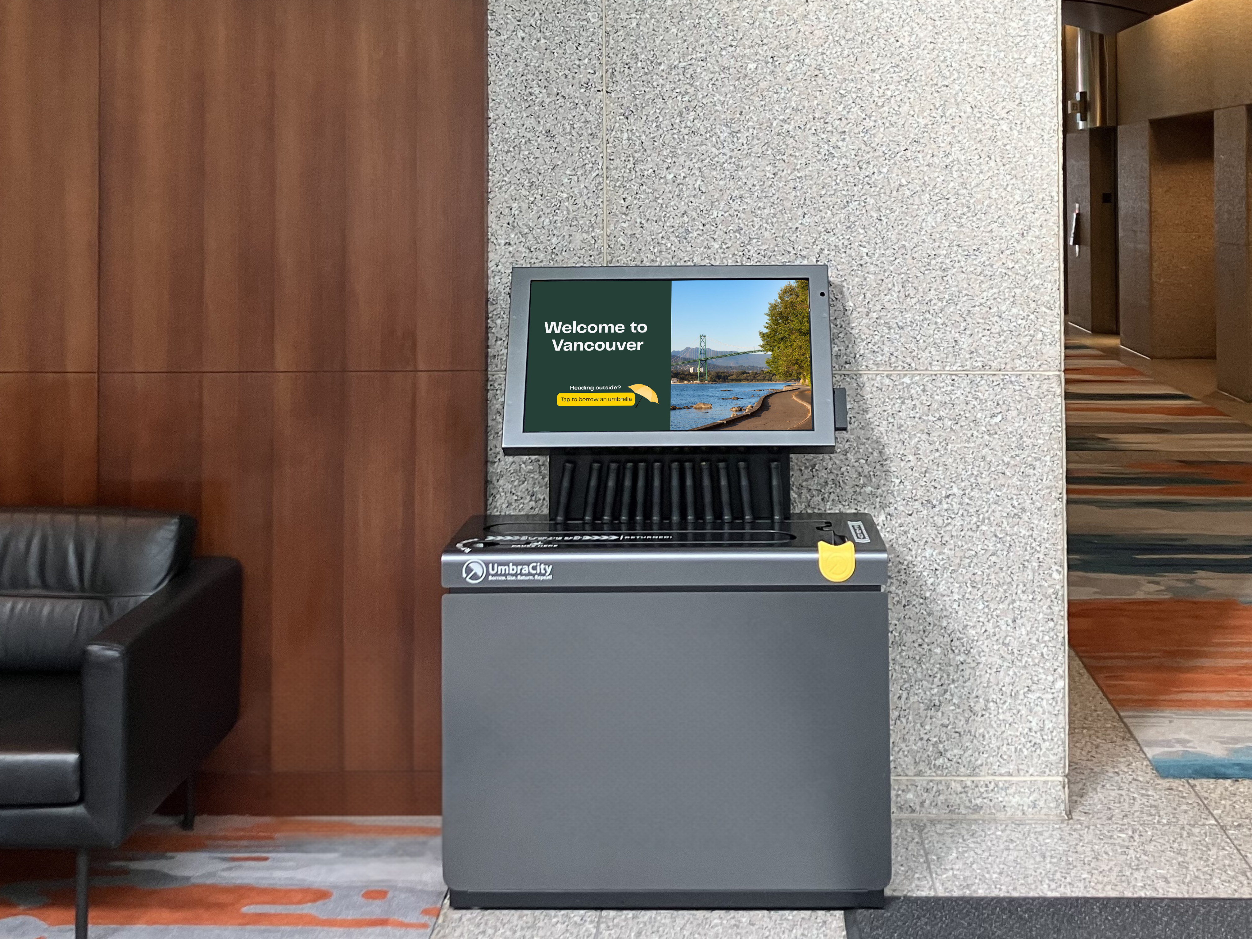 Branded UmbraCity umbrella kiosk installed in a hotel lobby